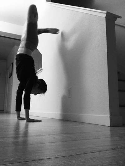 A yogi doing a handstand